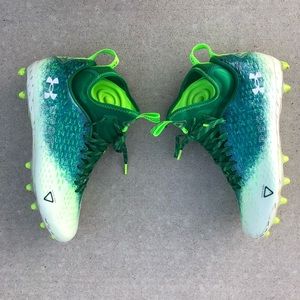 Under Armour football cleats. Green and white. Size 11.5.